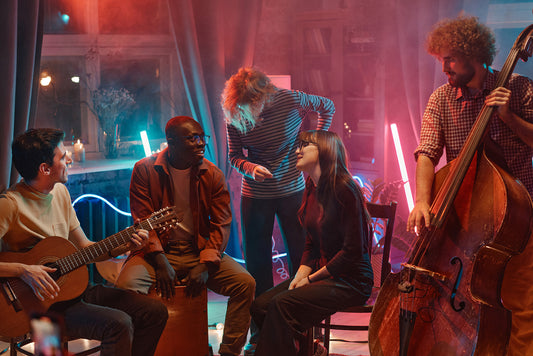 A group of musicians, bathed in colorful stage lights, passionately perform jazz music in a dimly lit Kansas City venue, showcasing the city's vibrant cultural scene.