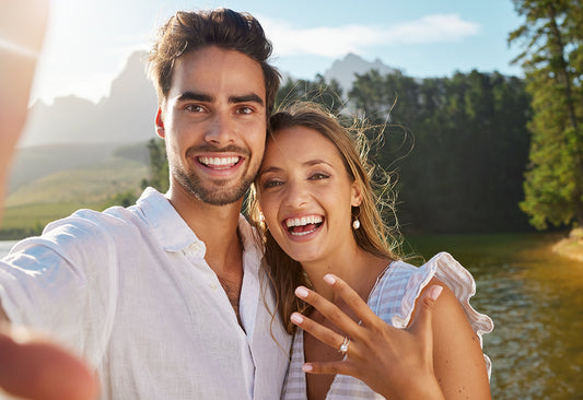 New beginnings with my best friend. Shot of a young couple taking a selfie after getting engaged_