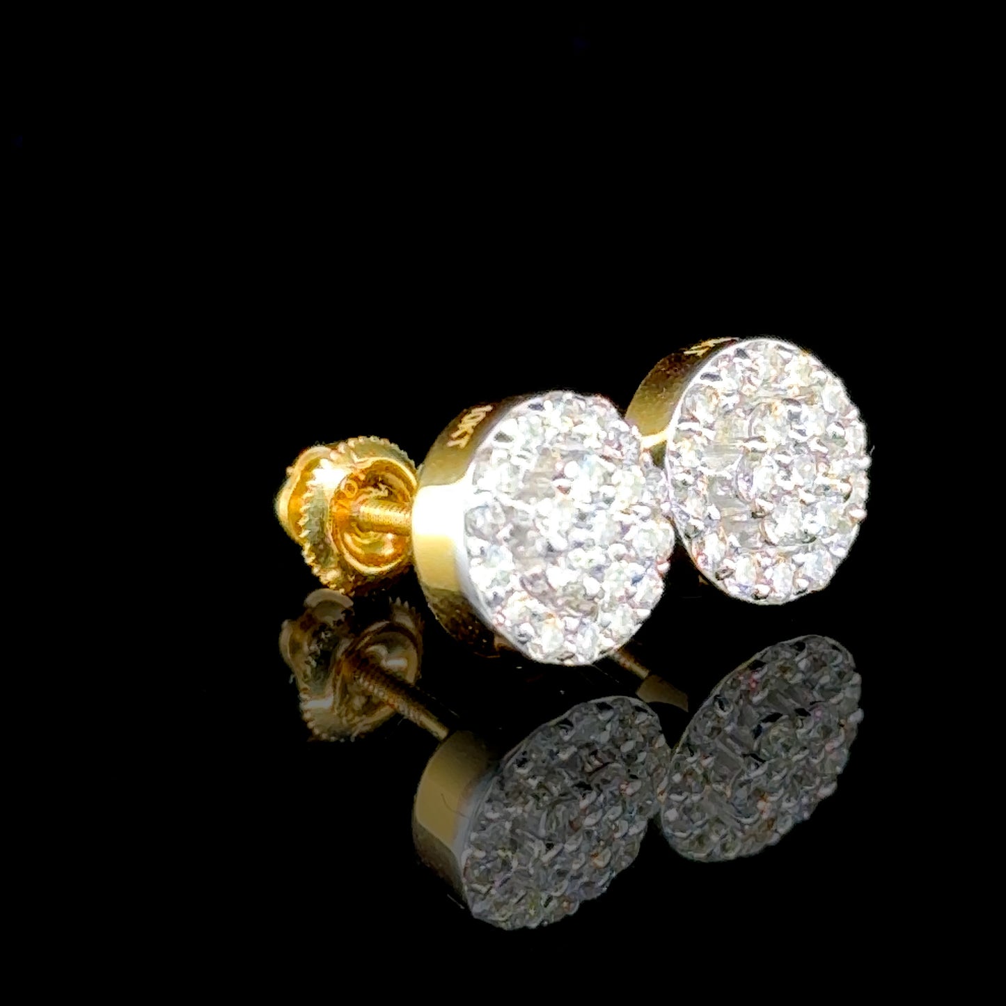 Classic 0.55 carat diamond stud earrings in yellow gold