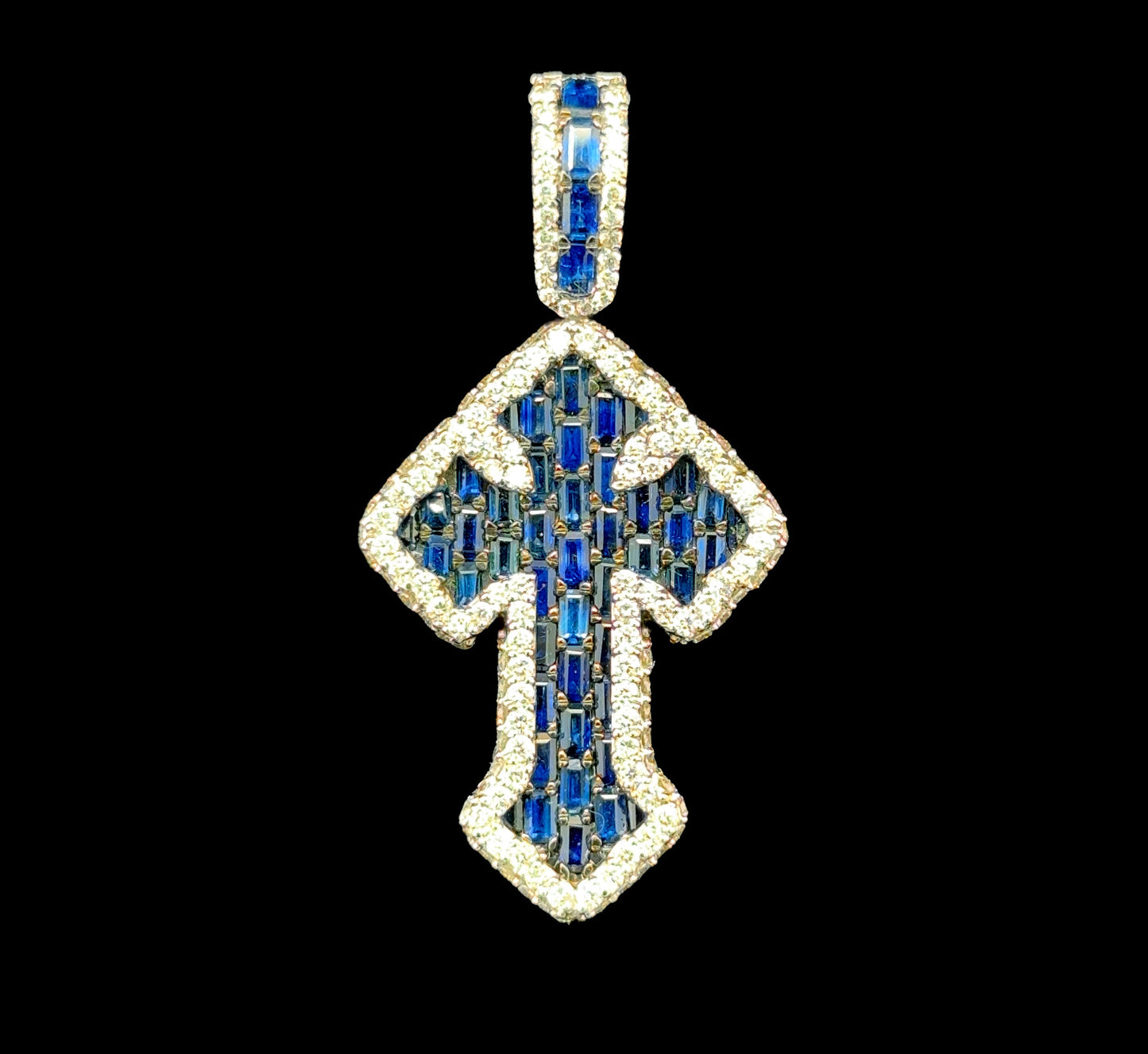 White gold cross pendant featuring 1.87 carats of diamonds and a 2.60ct sapphire.