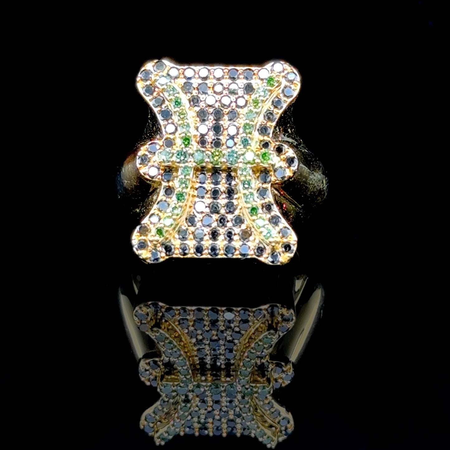 Yellow gold Pisces ring with black and green diamonds