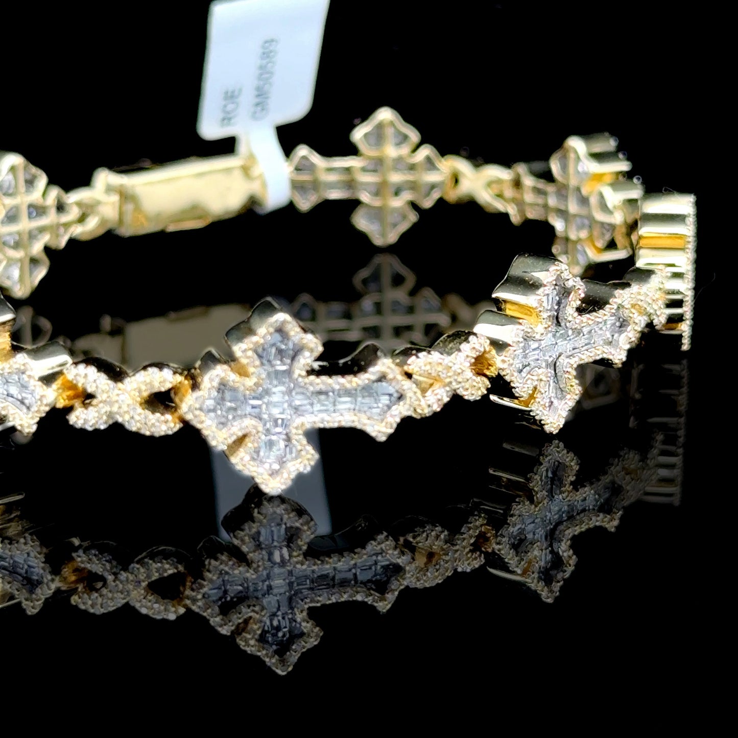 Statement cross bracelet with diamonds in yellow gold