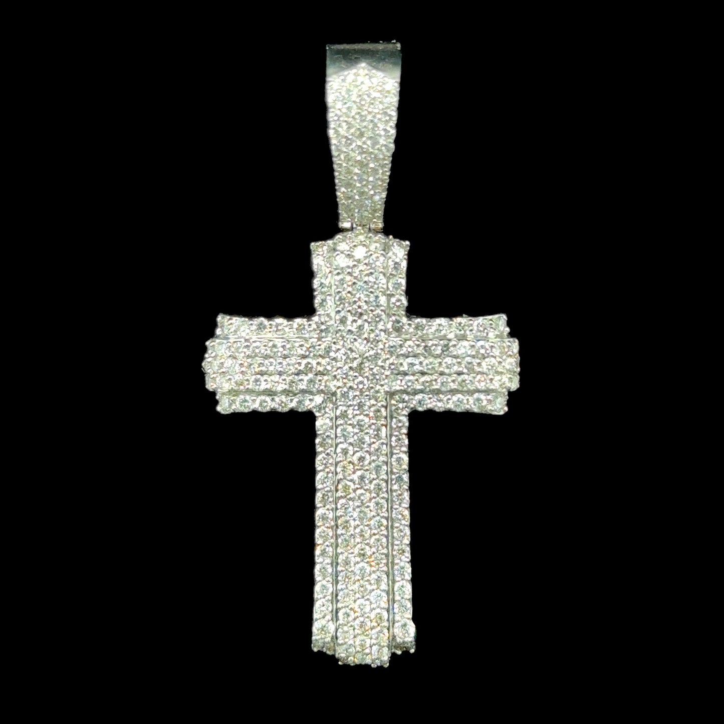 Elegant white gold cross pendant illuminated by 2.23 carats of high-quality diamonds.