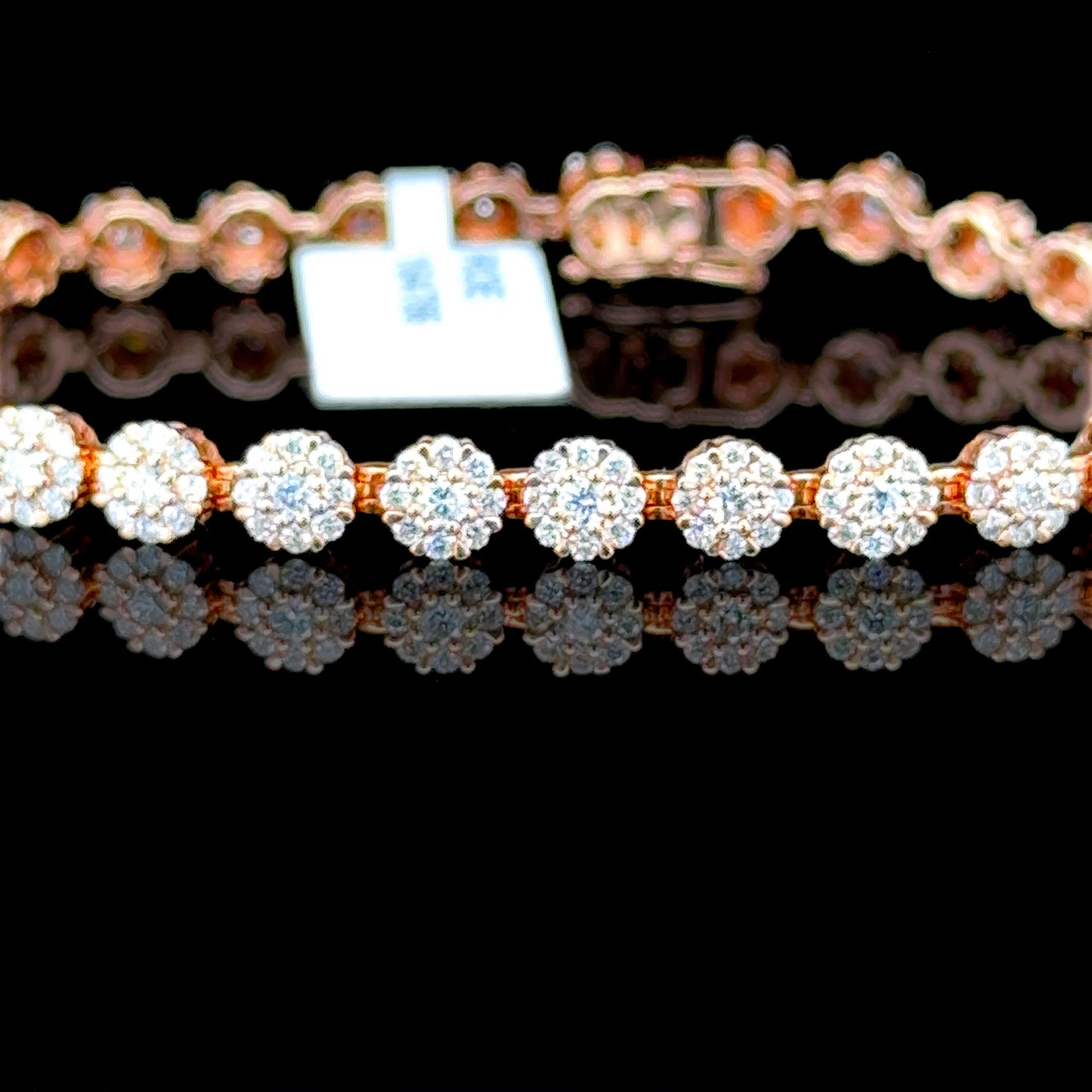10K rose gold bracelet with diamonds in a flower design