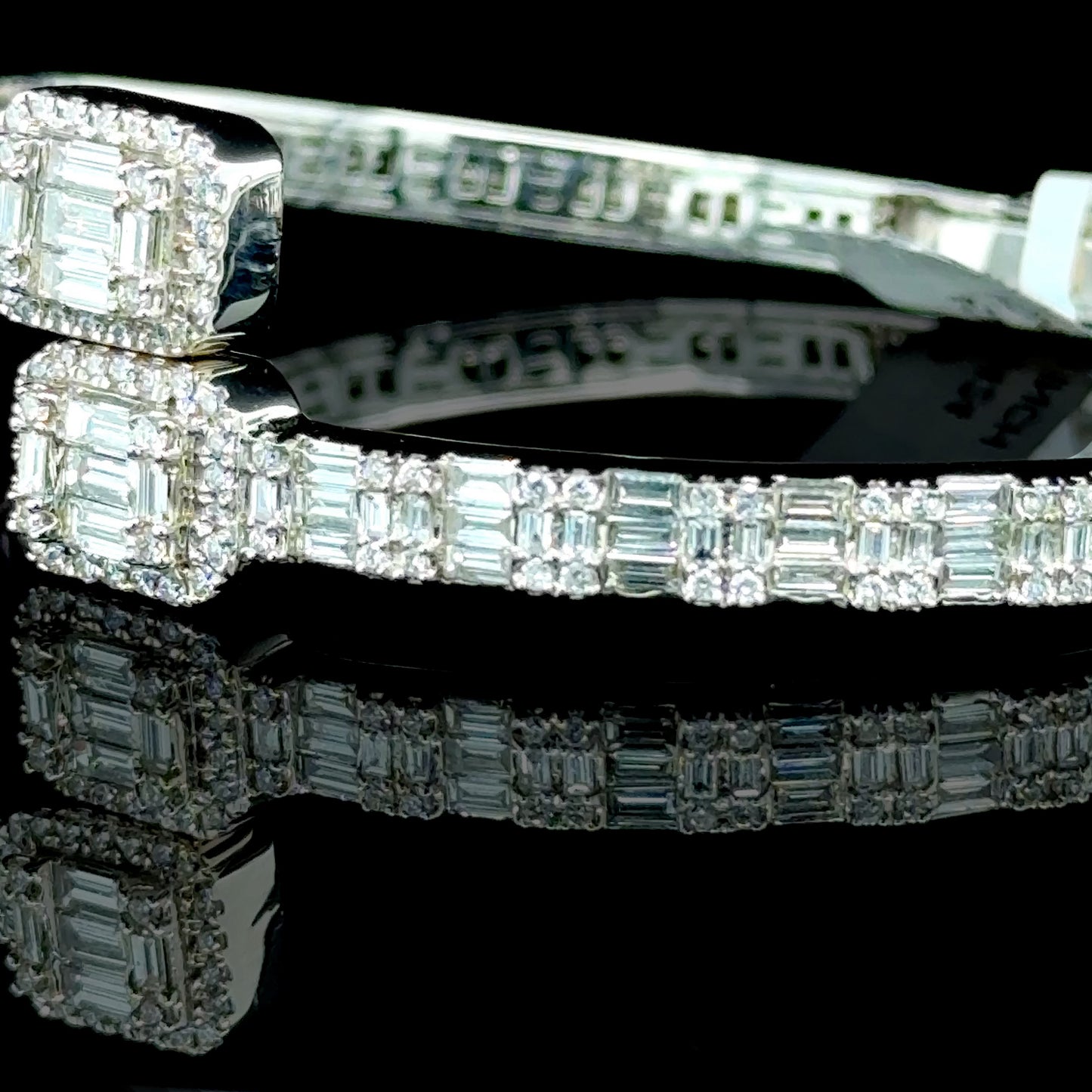 14K white gold diamond bangle with 6.88 carats of diamonds.