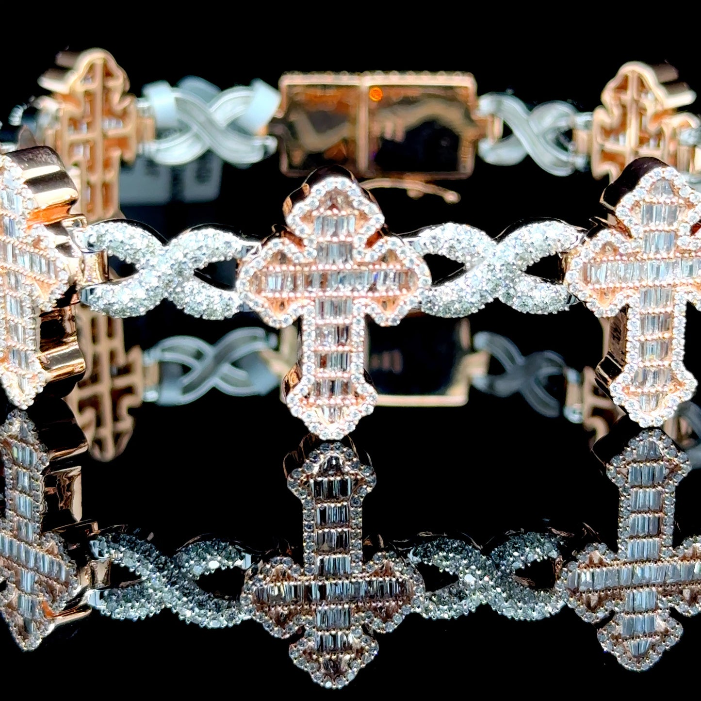 Two-tone gold diamond cross bracelet with 7.01 carats of diamonds
