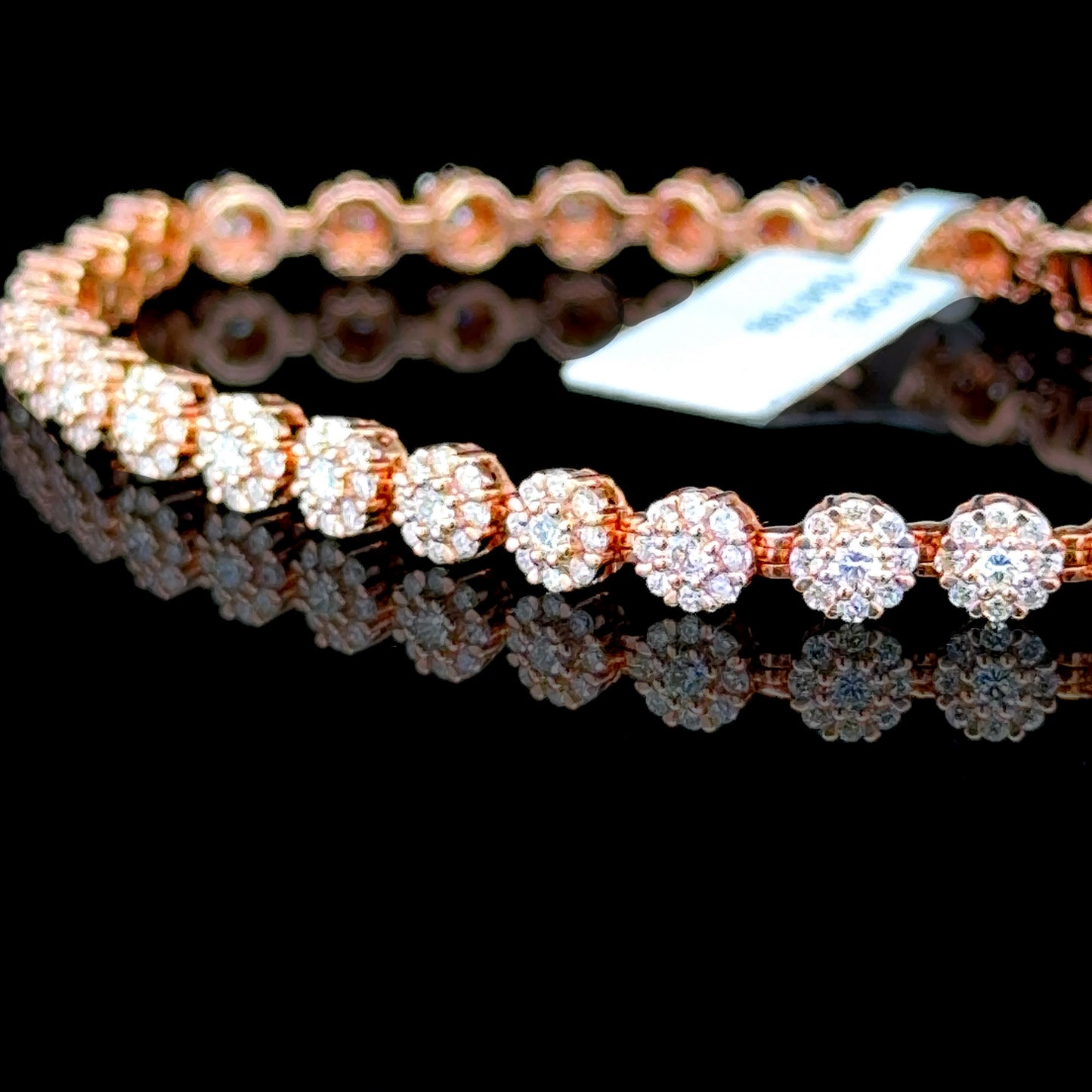 Rose gold diamond flower bracelet with 2 7/8 carats of diamonds