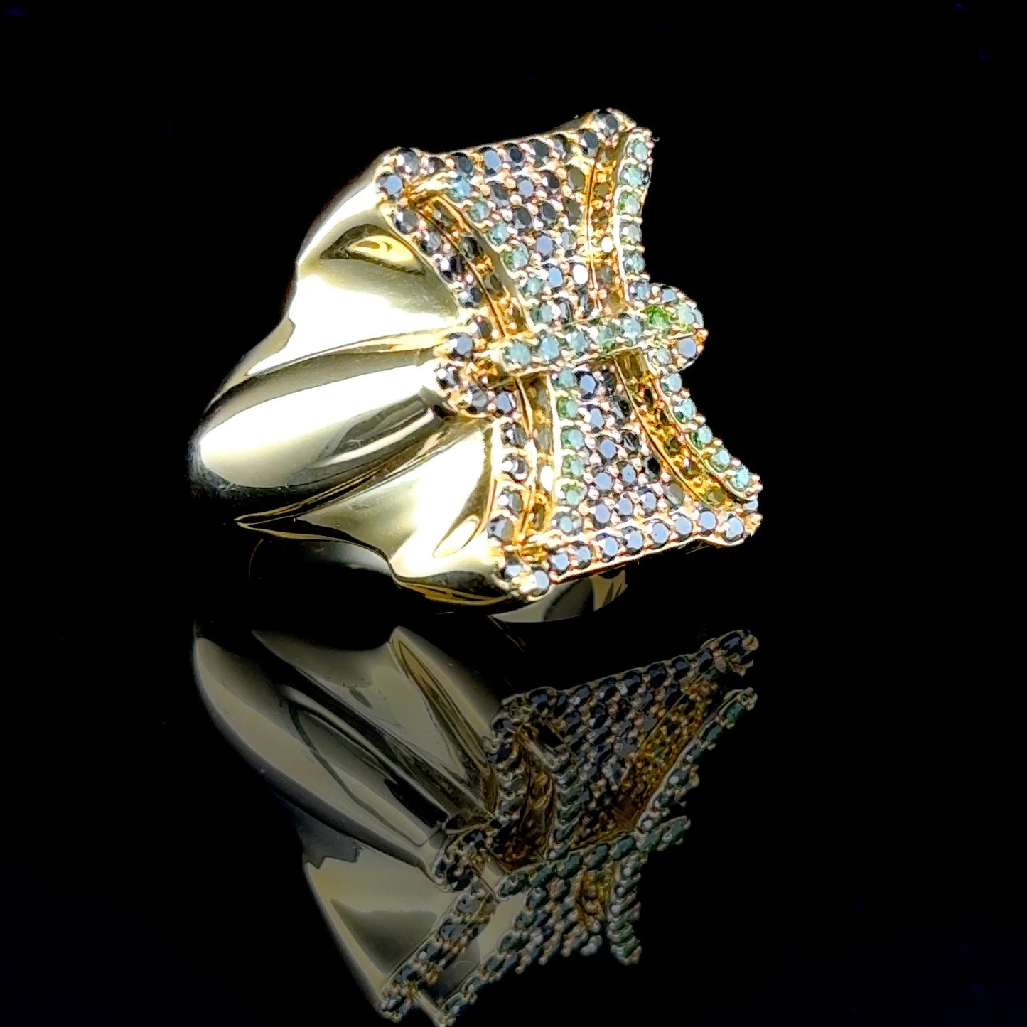 Unique colored diamond ring with black and green stones in Pisces design