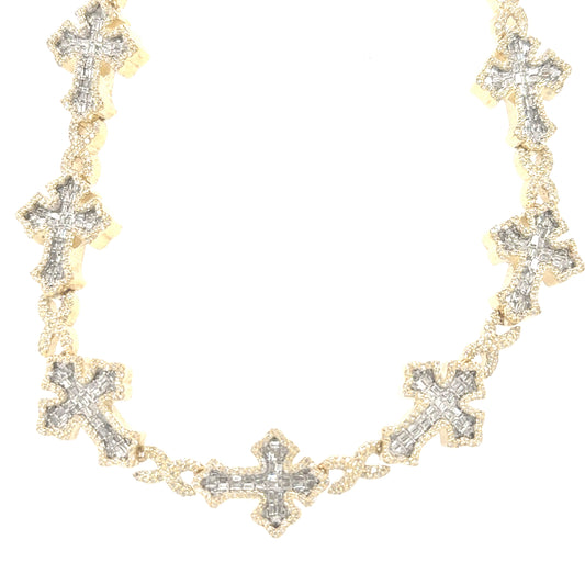 Close-up of a 10K yellow gold cross pendant, showcasing the intricate detail and brilliance of 8.09 carats of diamonds, on a 22-inch chain