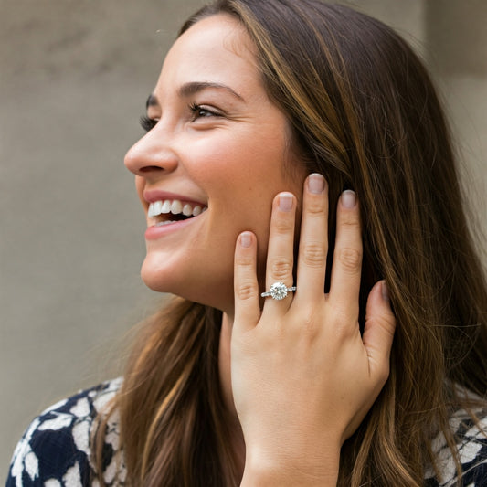Smiling woman wearing a custom made engagement ring