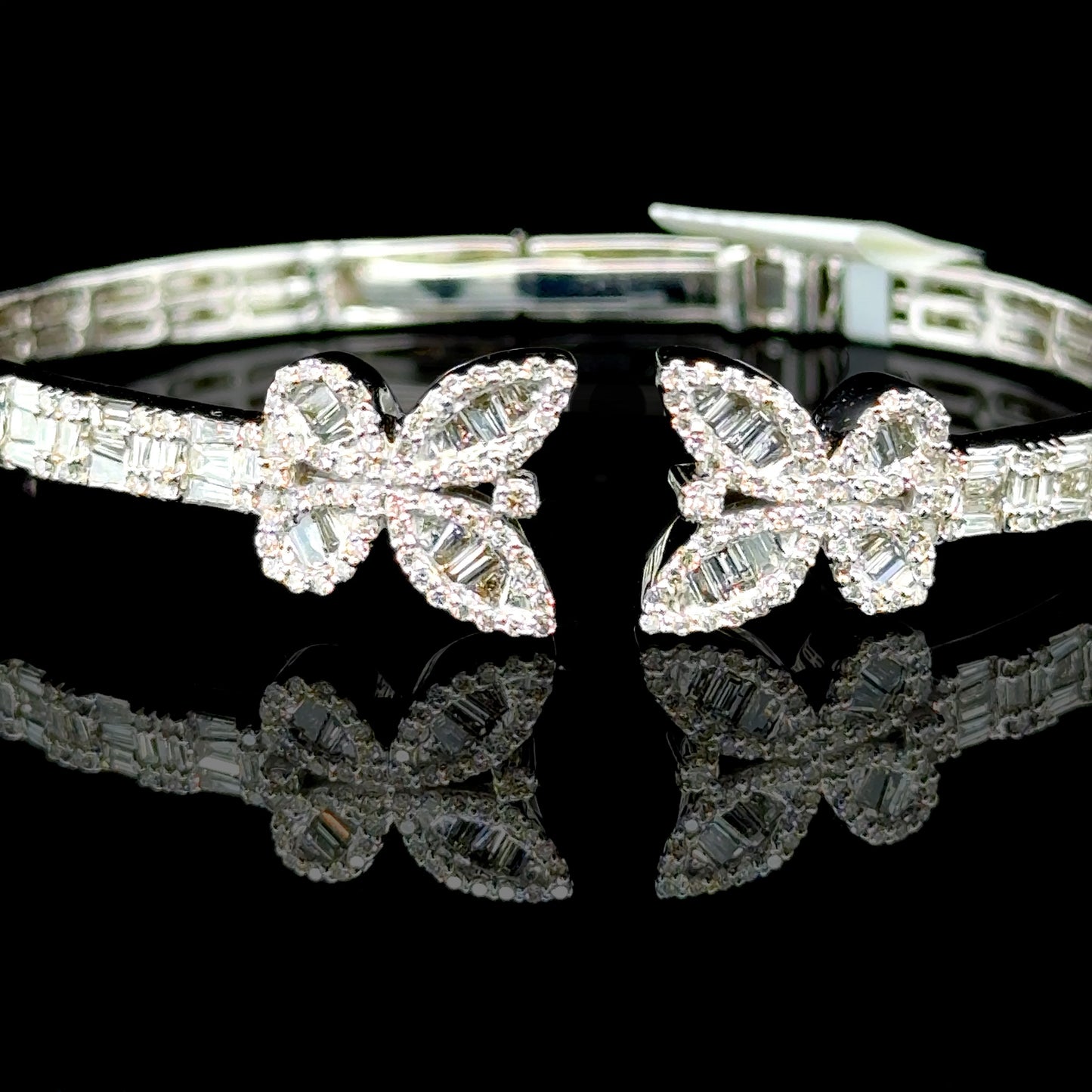 Luxury diamond bangle in white gold with a butterfly design