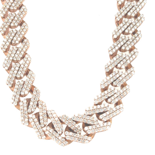 10K rose gold 14mm Cuban link chain featuring 33.96 carats of VS clarity, FG color diamonds.