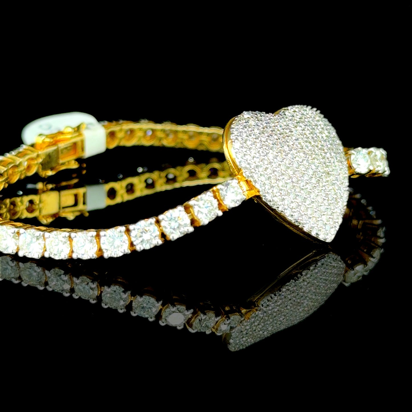 10K yellow gold heart-shaped diamond tennis bracelet, 10.25ct diamonds.