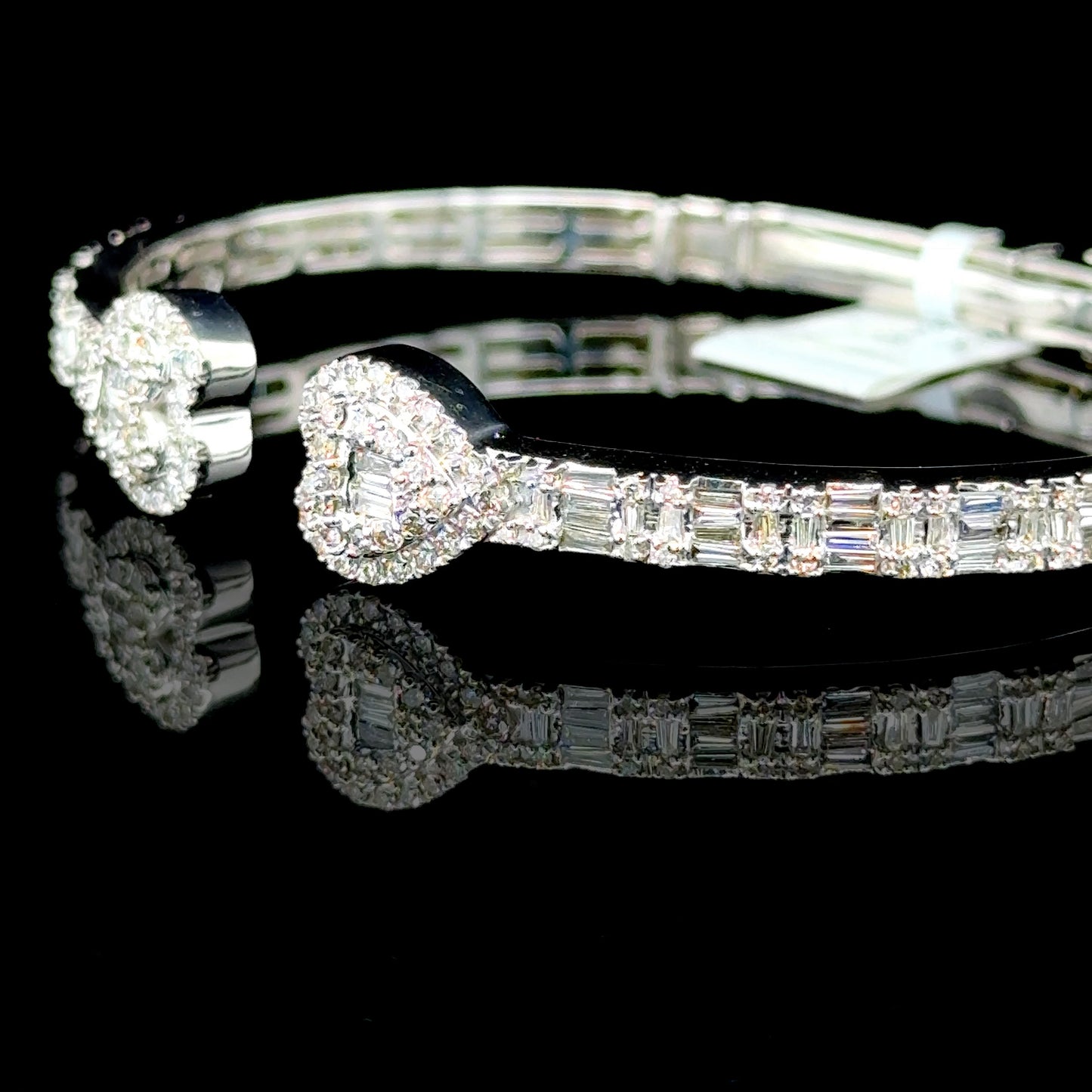 White gold bangle featuring heart design with 1.83ct diamonds