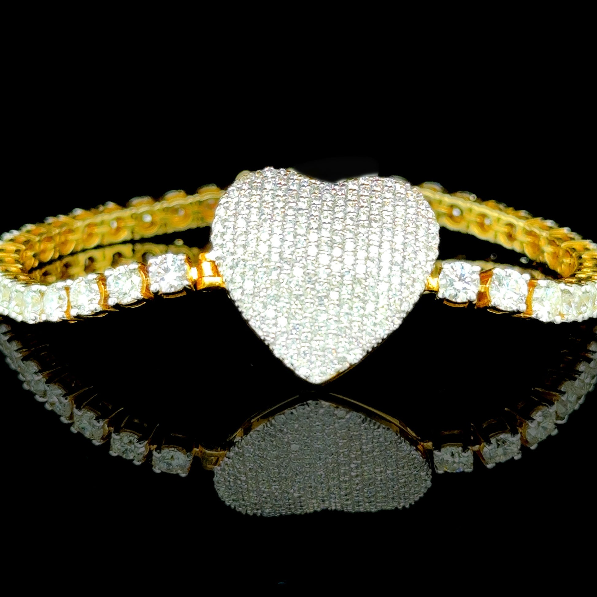 Yellow gold heart tennis bracelet with 10.25 carats of diamonds