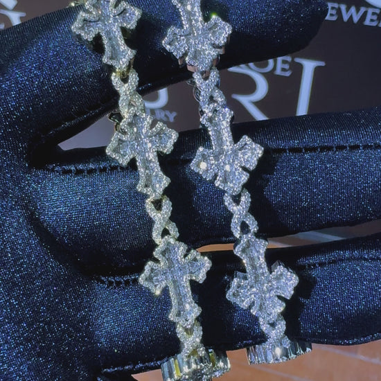Yellow Gold and Diamond Cross Jewelry in Hand in ROE Jewelry Kansas