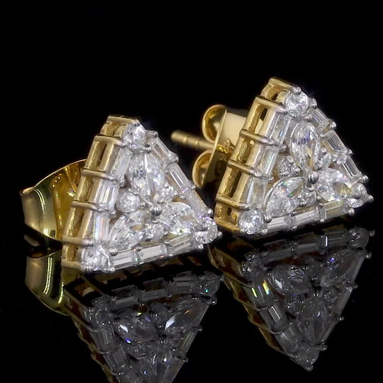 10K yellow gold earrings featuring 0.71 carats of VVS clarity, GH color diamonds.