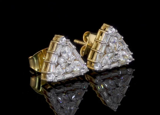 10K yellow gold earrings featuring 0.71 carats of VVS clarity, GH color diamonds.