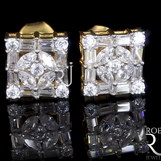 10K yellow gold earrings featuring 0.57 carats of VS-VVS clarity, GH color diamonds