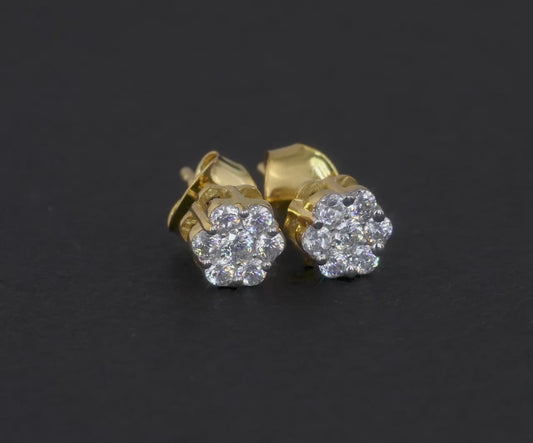 10K yellow gold earrings featuring 0.25 carats of VS clarity, G color diamonds in a flower setting.