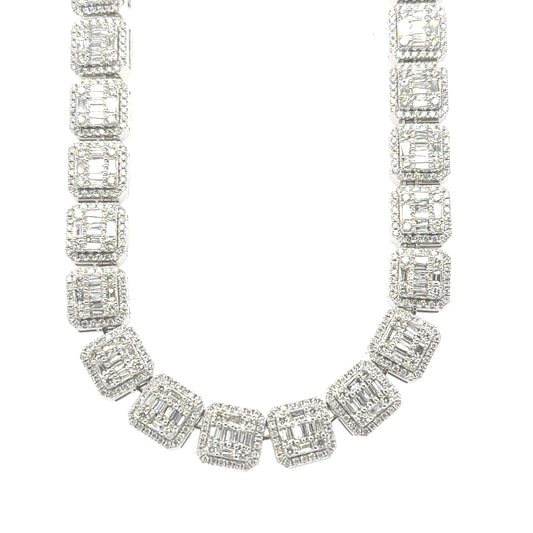 Exquisite 14K white gold tennis necklace adorned with 13.50 carats of sparkling diamonds. 