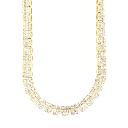 10K yellow gold tennis necklace featuring 9.71 carats of baguette-cut VS clarity, G color diamonds.